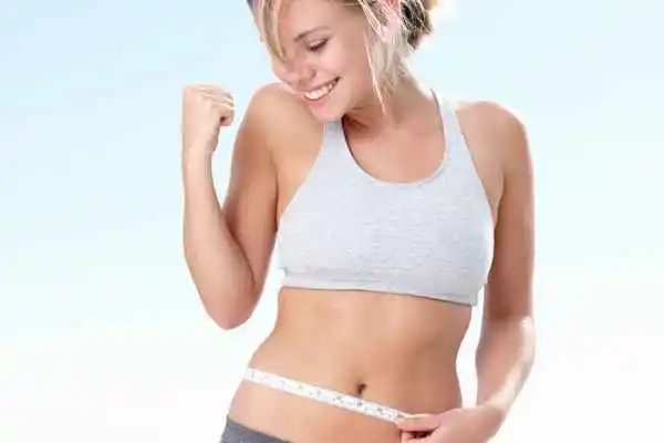 woman happy after fat reduction treatment Greater London (Croydon)