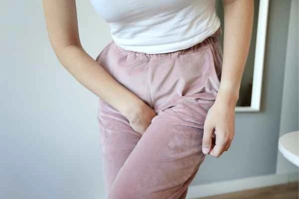 woman running for the toilet because of urinary incontinence Greater London (Croydon)